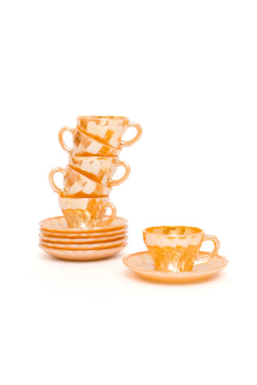 Vintage perzik-kleurige jaren 50 kop en schotels Anchor Hocking Fire King