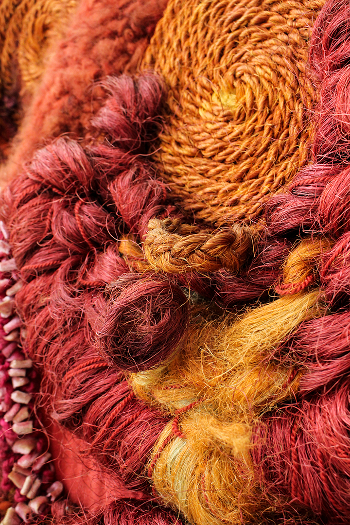 Jaren 70 wandkleed warme kleuren gevlochten met veel textuur