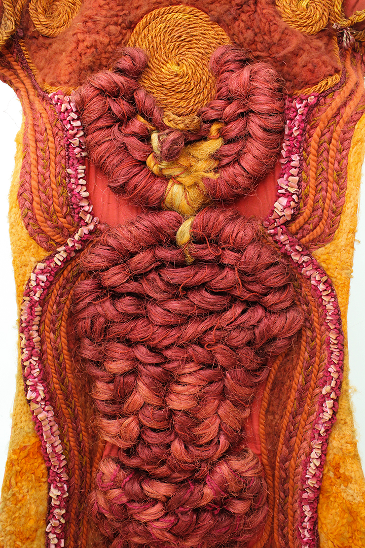 Jaren 70 wandkleed warme kleuren gevlochten met veel textuur