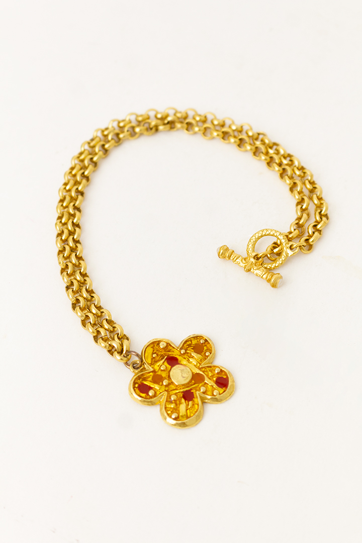 Jaren 80 ketting met schakels en gekleurde bloem als hanger