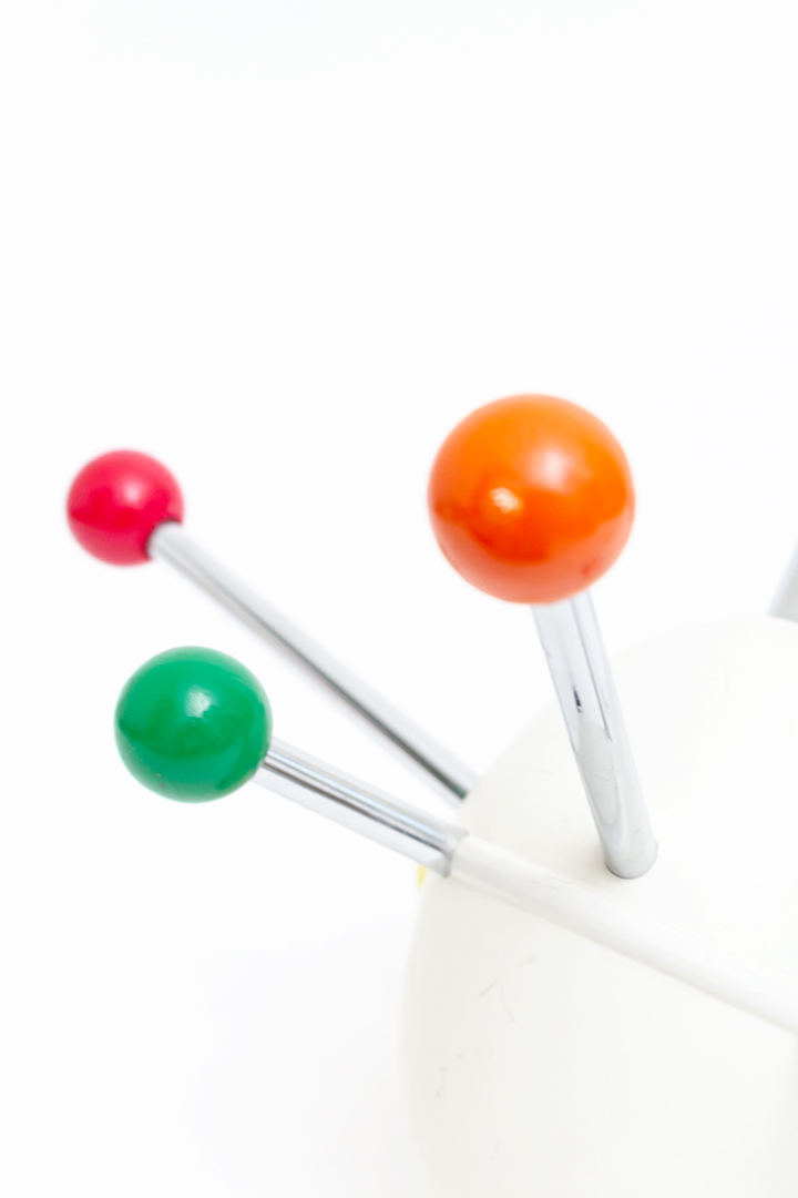 Sputnik kapstok Osvaldo Borsani jaren 70 gekleurd