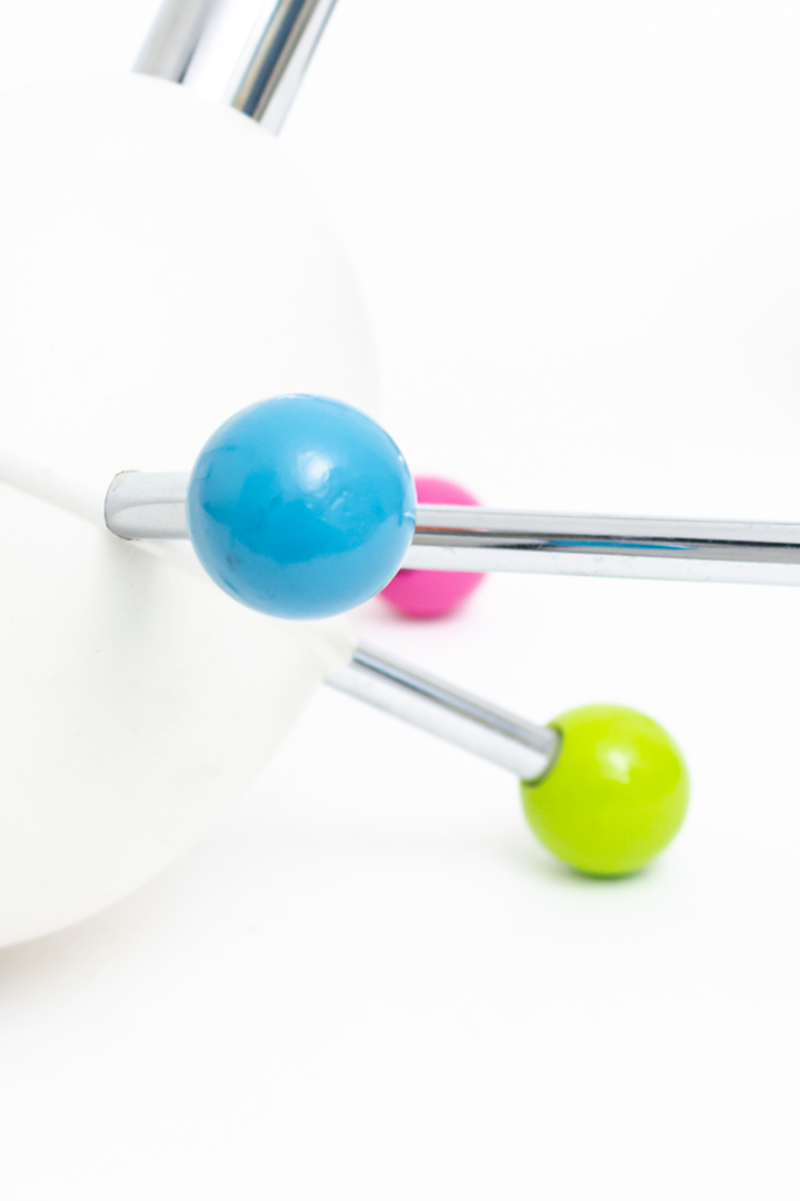 Sputnik kapstok Osvaldo Borsani jaren 70 gekleurd