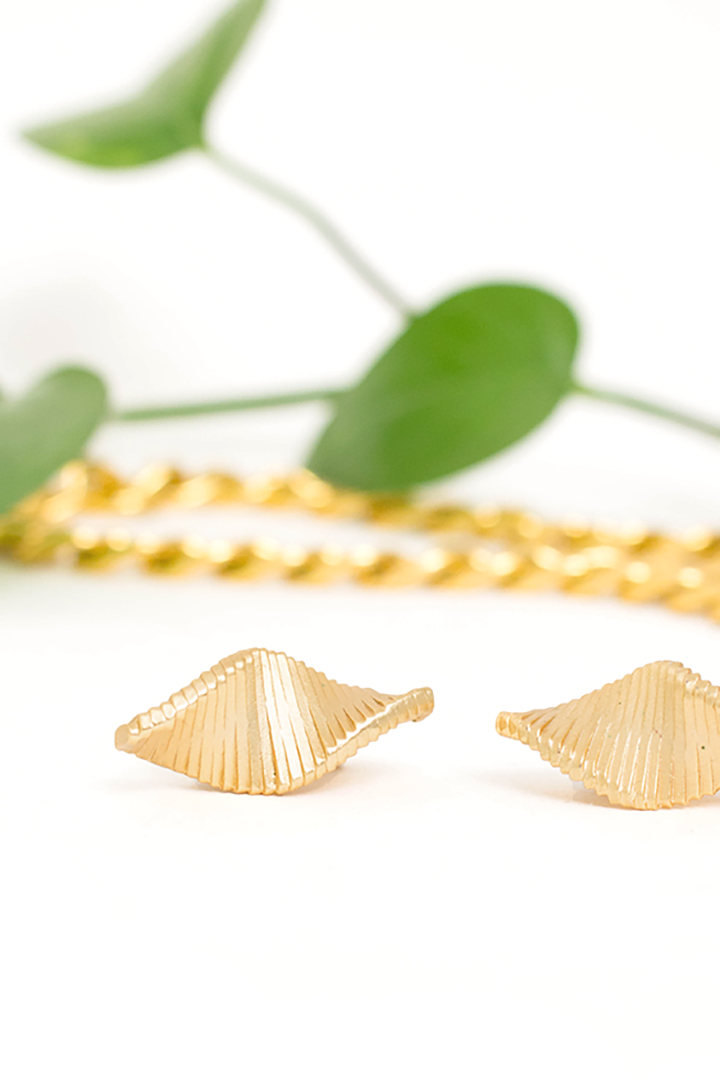 Vergulde clip-on oorbellen twist jaren 80 Claude Montana