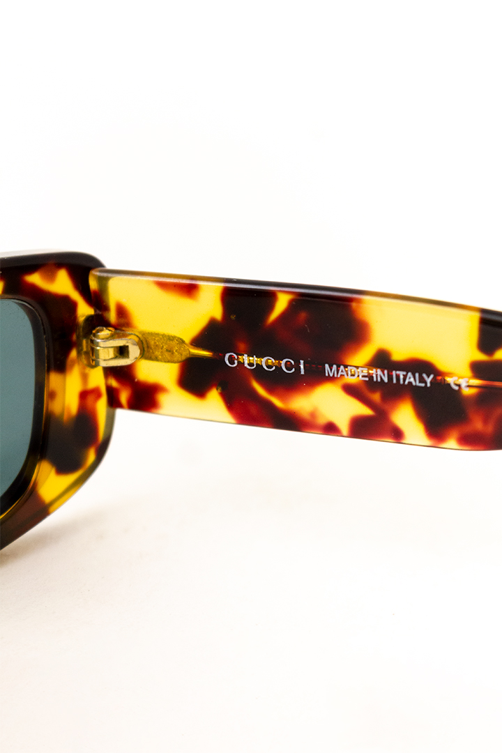 Vintage Gucci zonnebril met bruin gemêleerd rechthoekig montuur
