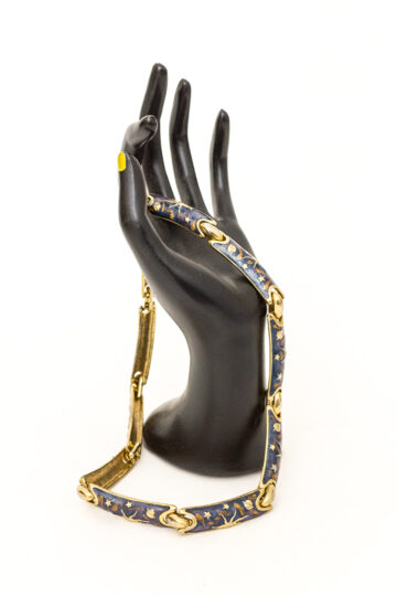 Vintage blauwe emaille ketting met zonnen en sterren