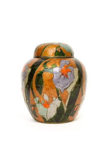 Vintage geëmailleerde oranje gemberpot met orchideeën