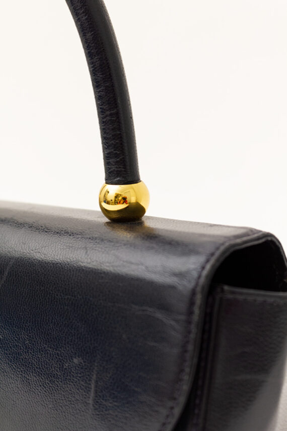 Vintage handtas van zwart leer met goudkleurige bolletjes Hanae Mori