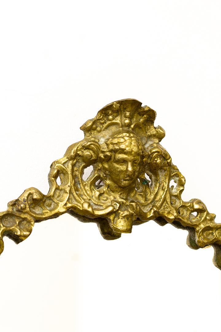 Vintage messing spiegel met decoratief hoofdje