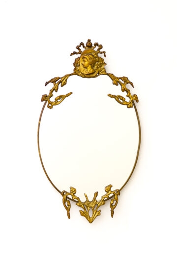 Vintage ovale messing spiegel met barok details en vrouwenhoofd