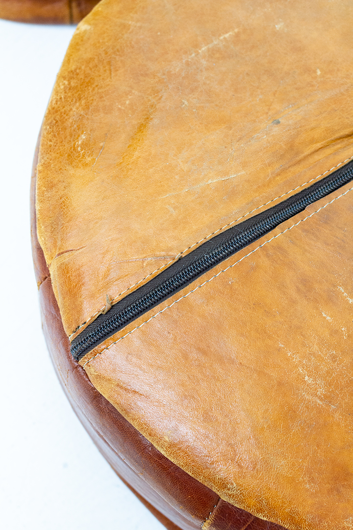 Vintage poef van bruin leer