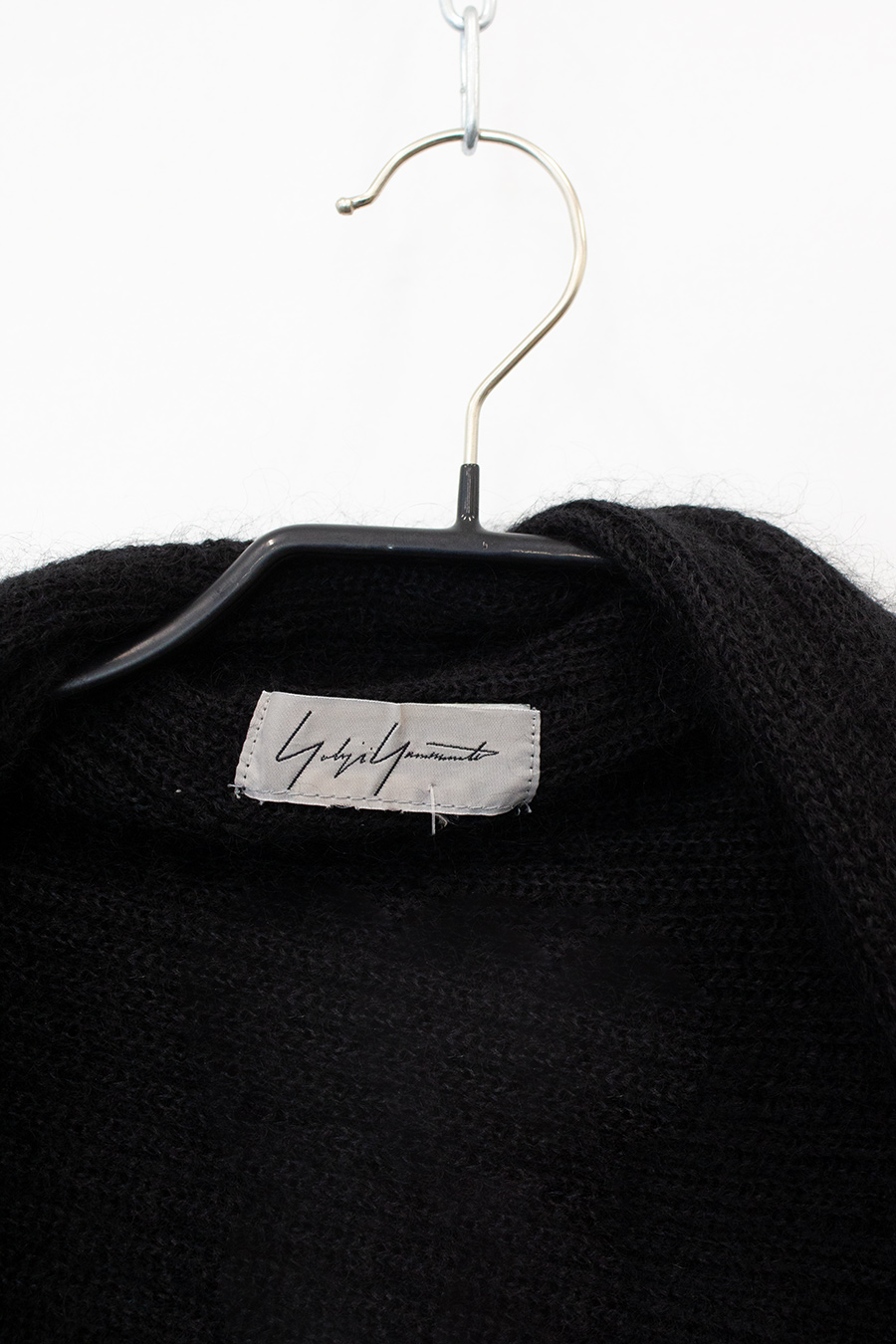 Yohji Yamamoto gebreide cape met asymmetrische mouwen