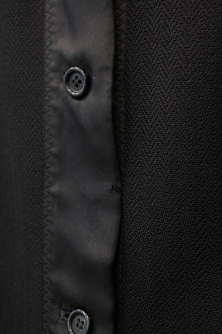 Zwarte wollen Dries van Noten jasje met knopen en satijnen band